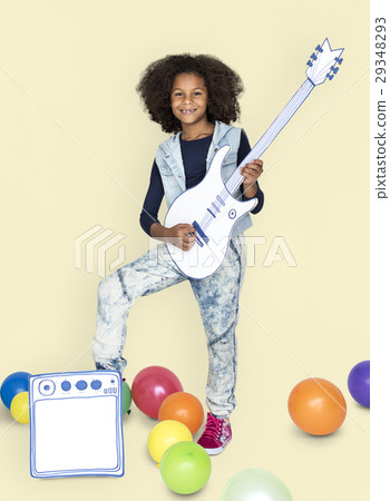 Portrait of a Little African Descent Girl with a Guitar Isolated 29348293