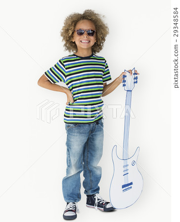 Portrait of a Little African Descent Boy with a Guitar Isolated Portrait of a Little African Descent Boy with a Guitar Isolated 29348584