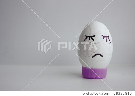 The egg is funny with the face on the stand The egg is funny with the face on the stand 29353816