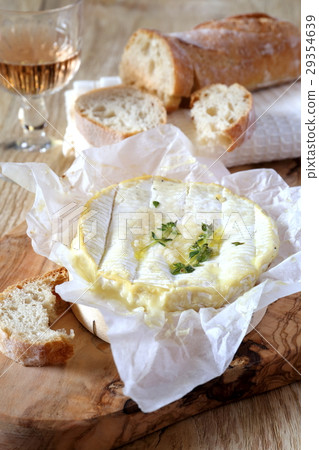 Camembert fondue and wineglass Camembert fondue and wineglass 29354639