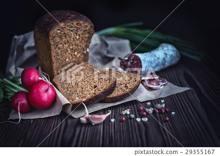 sliced brown bread, salami, radish, garlic, onions sliced brown bread, salami, radish, garlic, onions 29355167