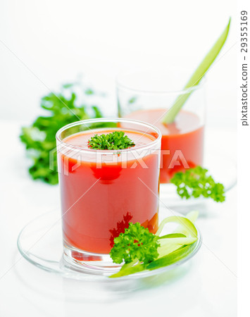 tomato juice in transparent glasses with parsley tomato juice in transparent glasses with parsley 29355169
