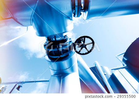 Steel pipelines and valves in blue tones Steel pipelines and valves in blue tones 29355500
