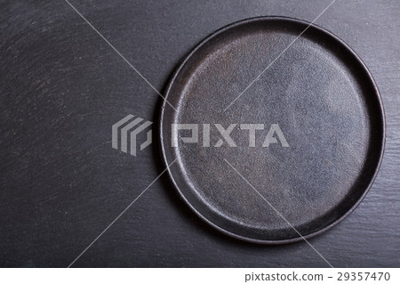 empty pan in a dark table empty pan in a dark table 29357470