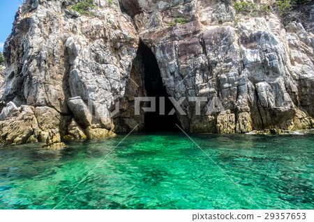 Rock cliff emerald sea in lipe island 29357653