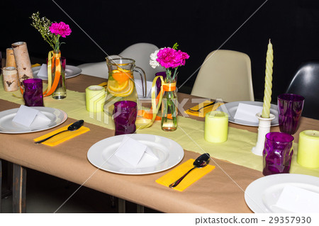 Decorated table in mexican style ready for dinner Decorated table in mexican style ready for dinner 29357930