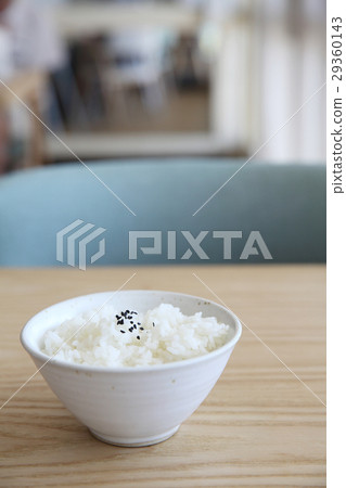 Rice on wood background Rice on wood background 29360143