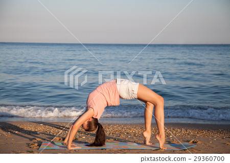 the girl is engaged in fitness and yoga the girl is engaged in fitness and yoga 29360700