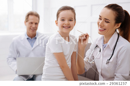 Sweet cheerful girl having fun while visiting 29361237