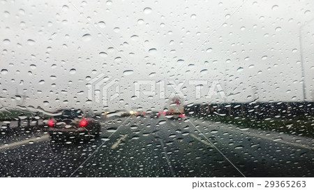 Driving the car on rainy highway. POV shot. Driving the car on rainy highway. POV shot. 29365263