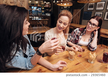 Photo of happy girls while celebrating together Photo of happy girls while celebrating together 29365460