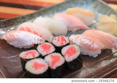 Delicious handful sushi 29366278