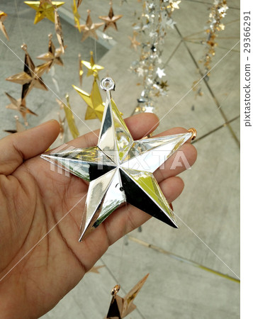 Man Hand and decoration star. Man Hand and decoration star. 29366291