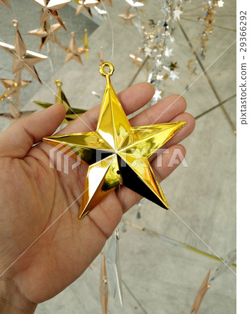 Man Hand and decoration star. Man Hand and decoration star. 29366292