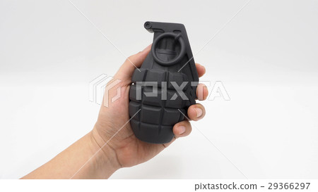 Man hand and military bomb plastic model toy. 29366297