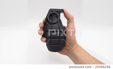 Man hand and military bomb plastic model toy. 29366298