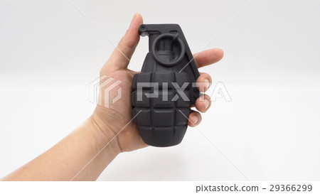 Man hand and military bomb plastic model toy. 29366299