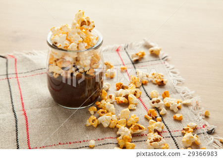 Chocolate dessert with popcorn. 29366983