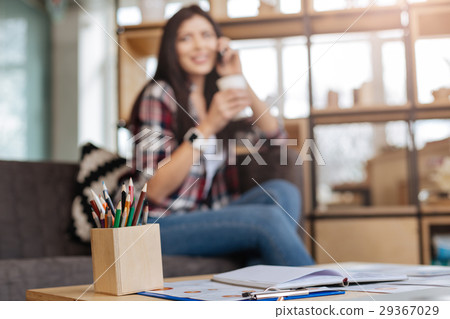 Different colored pencils standing in the box 29367029