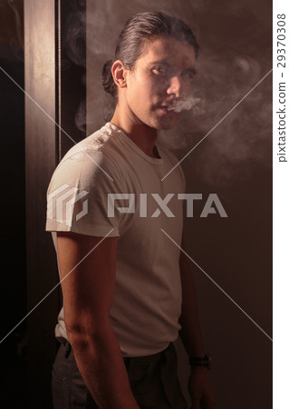 Beautiful romantic man with long hair. Beautiful romantic man with long hair. 29370308