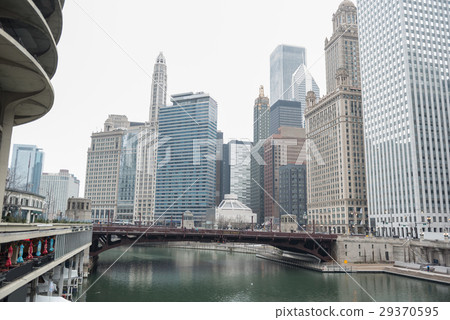 Imposing tall buildings situating near river Imposing tall buildings situating near river 29370595