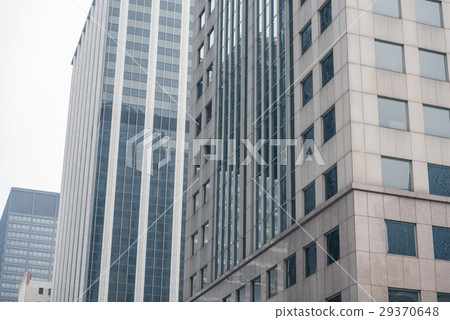 Modern multi-storey buildings lining up in queue 29370648