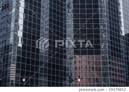 Imposing multi-storey buildings mirroring other 29370652
