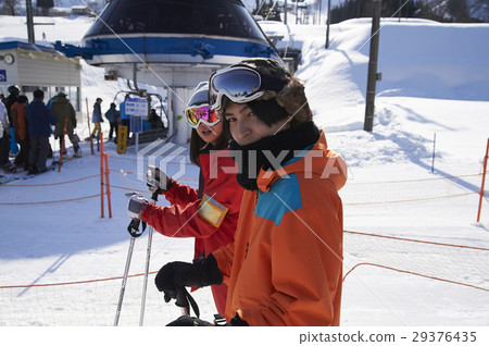 Ski resort couple Ski resort couple 29376435