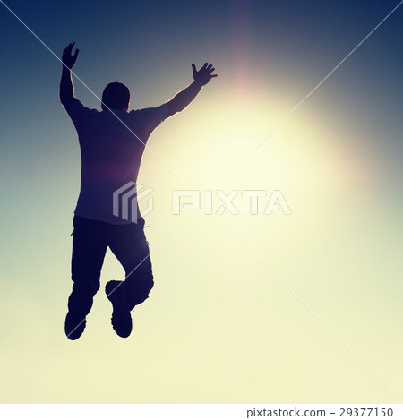 Crazy man is flying.Young man silhouette falling  29377150