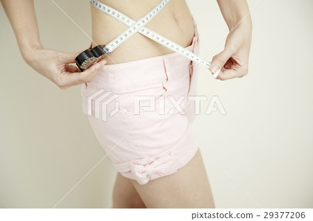 Diet image. Young women's waist measurements. No face. 29377206