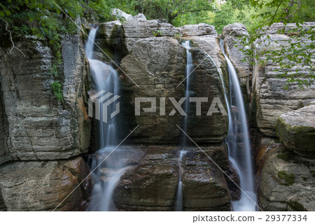 Waterfalls in green forest 29377334