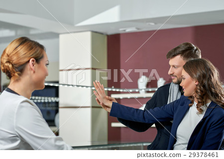 Beautiful couple at the jewelry store  29378461