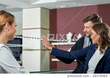 Beautiful couple at the jewelry store  29378464