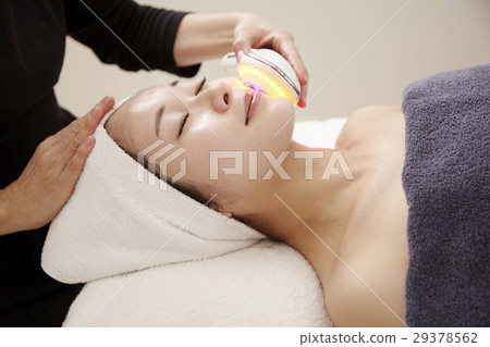 Esthetic equipment, image of beauty salon. Professional esthetic, treatment and 20s female model. 29378562