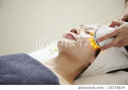 Esthetic equipment, image of beauty salon. Professional esthetic, treatment and 20s female model. 29378634