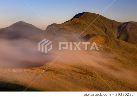 Iidake's mountains of clouds flowing evening lights · Kitaatake 29380253
