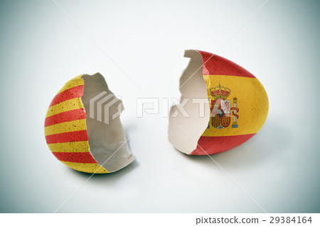 cracked eggshell with Catalan and Spanish flags cracked eggshell with Catalan and Spanish flags 29384164