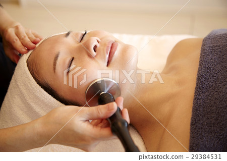 Image of esthetic equipment and beauty salon. Professional authentic esthetics, treatment and 20s female model. 29384531