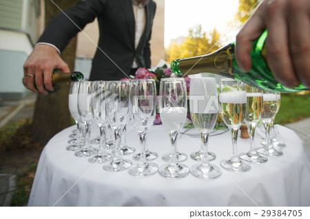 glasses with champagne. catering banquet table. a 29384705