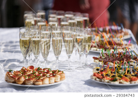glasses with champagne. catering banquet table. a glasses with champagne. catering banquet table. a 29384743