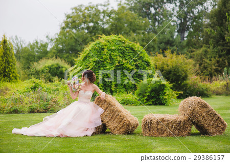 Portrait of a beautiful bride in park Portrait of a beautiful bride in park 29386157