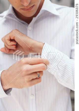 Close up of a hand businessman how wears white Close up of a hand businessman how wears white 29386878