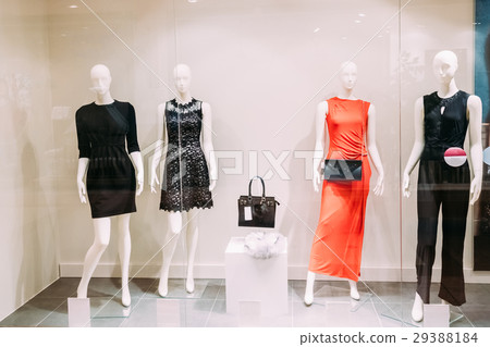 Mannequins Standing In Store Window Display Of 29388184