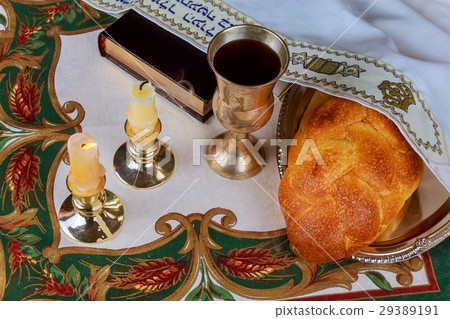 Shabbat candles in glass candlesticks with blurred Shabbat candles in glass candlesticks with blurred 29389191
