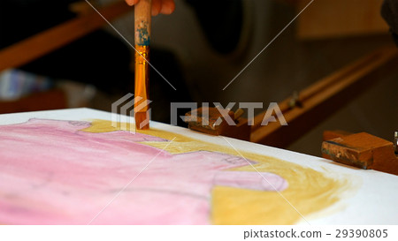Artist paints picture artwork canvas in art studio Artist paints picture artwork canvas in art studio 29390805