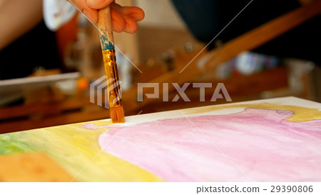 Artist paints picture artwork canvas in art studio Artist paints picture artwork canvas in art studio 29390806