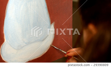 Female artist paints picture artwork in art studio Female artist paints picture artwork in art studio 29390809