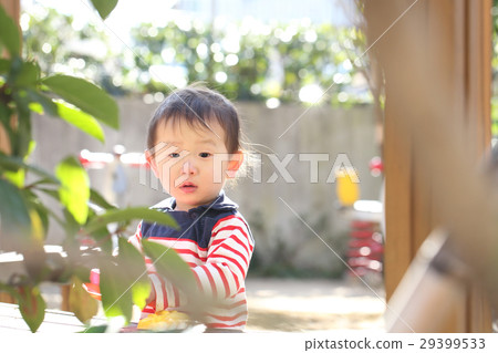 Two-year old boy playing in the park 29399533