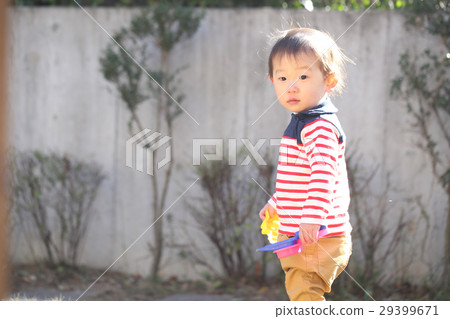 Two-year old boy playing in the park 29399671