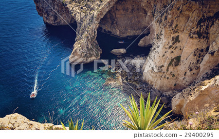 View of the Blue Grotto and small boats  29400295